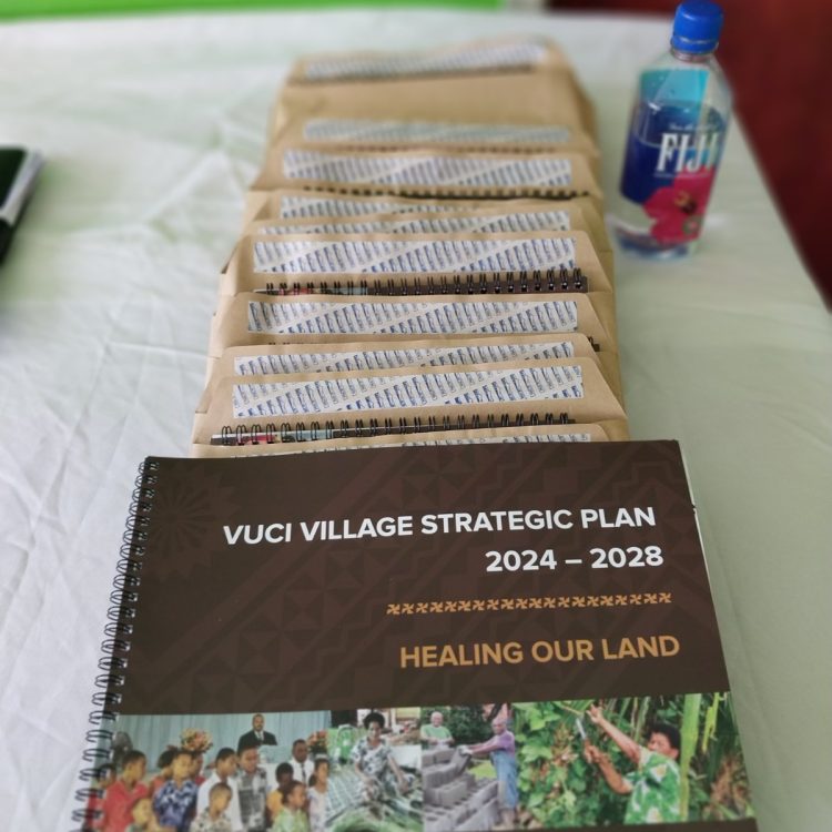 New copies of the Strategic Plan sit, ready for issuing to stakeholders.